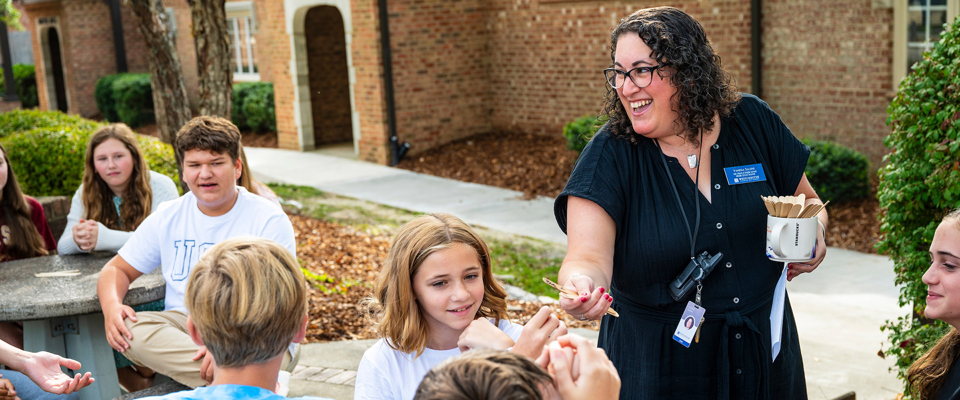 Students outside with their teacher