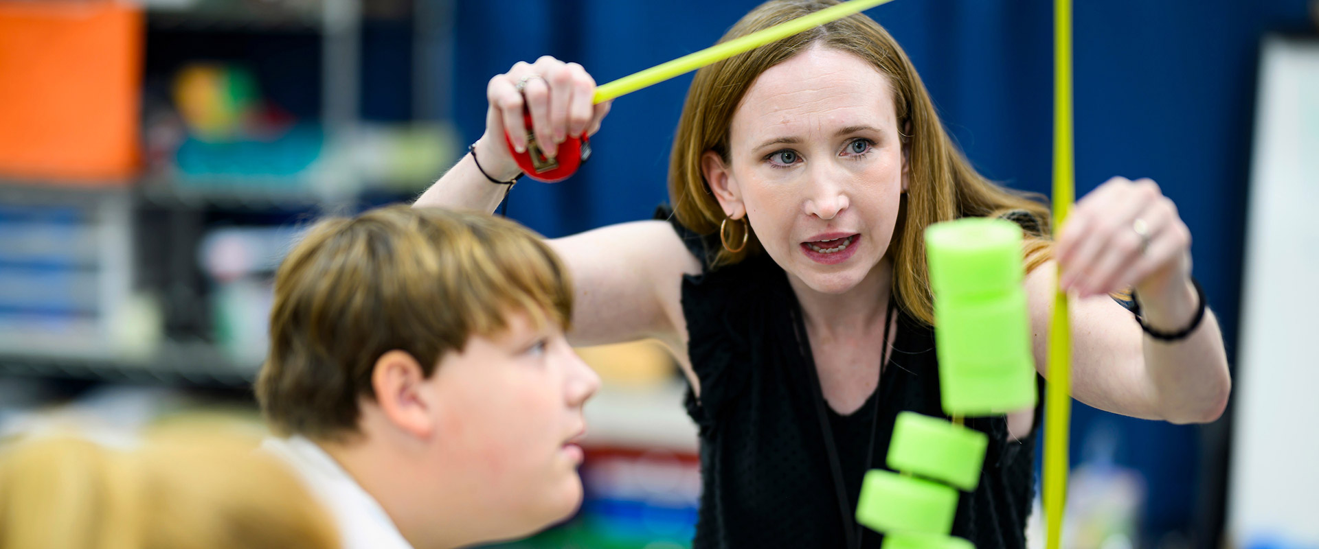 Student and teacher in STEAM class