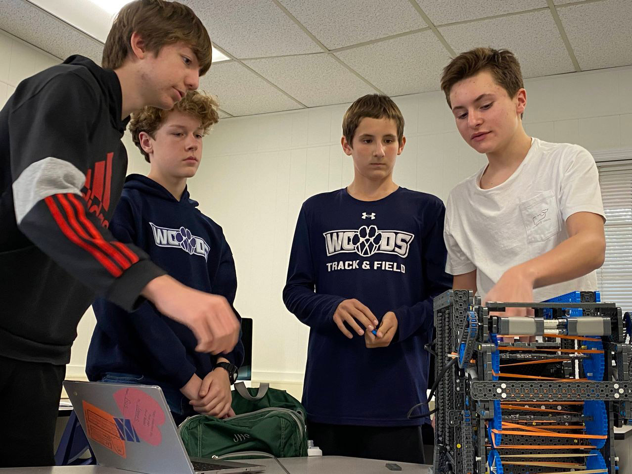 CyPurr Cats MS robotics team works on robot